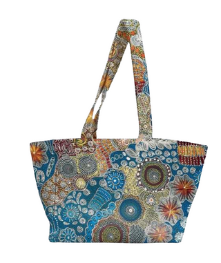 Colorful patterned tote bag on a white background